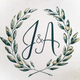 - AMY ROCHELLE PRESS - Hand painted sign with olive wreathe monogram for outdoor event design