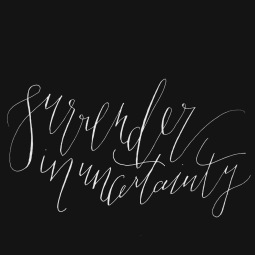 - AMY ROCHELLE PRESS - "Surrender in Uncertainty". Wispy lettering against jet black.