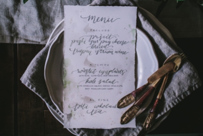 - AMY ROCHELLE PRESS - Detail view of menus with deckled edges, pearl accents, and soft gray and emerald ink. Photo by Eva Kosmas Flores